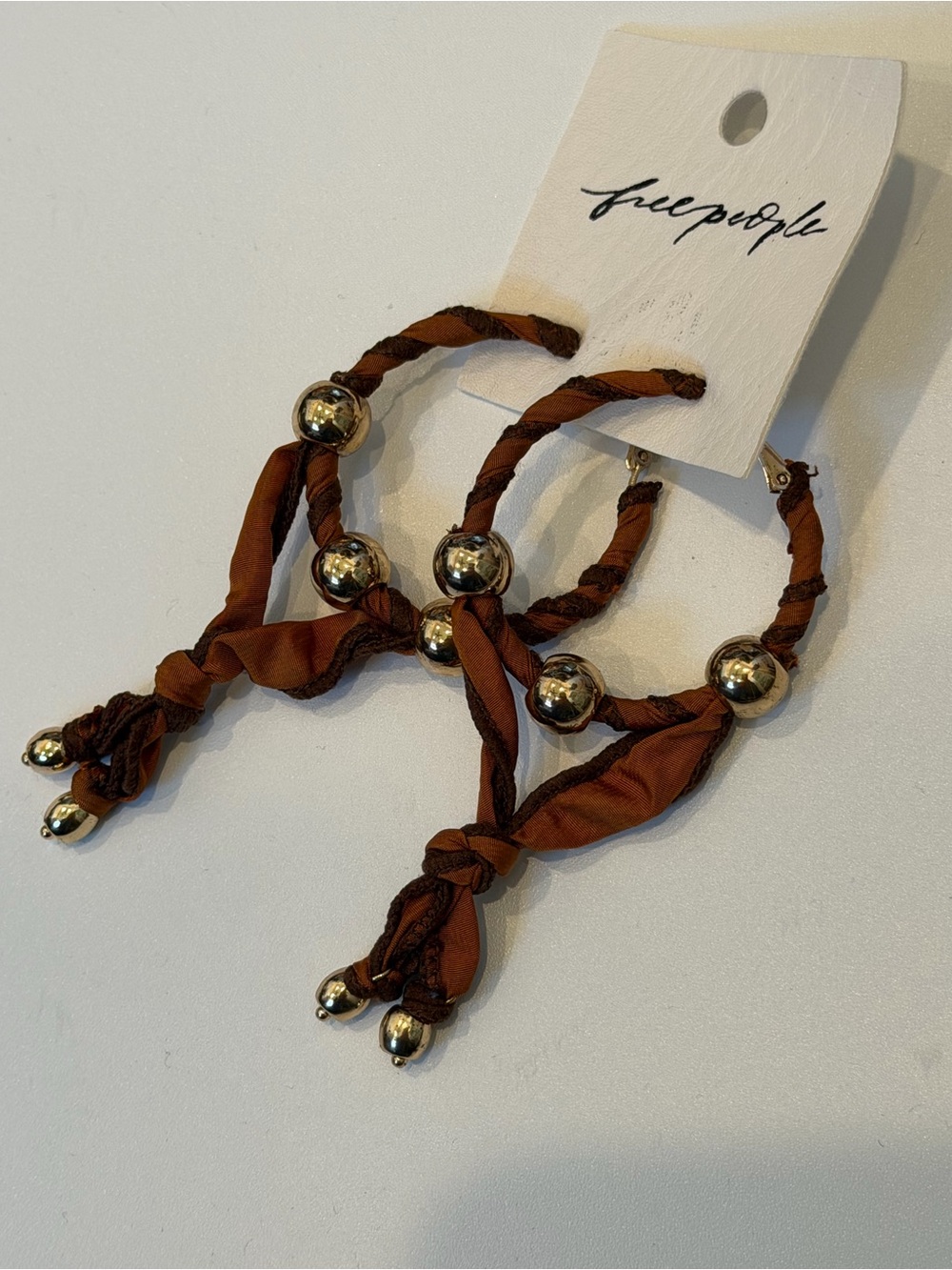 Free People Rust Braided Hoop Earrings with Gold Beads